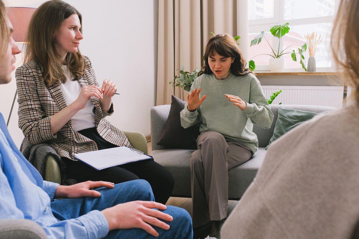 Women talking together in a living room