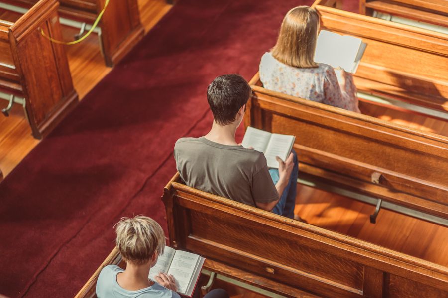 Worshipers seated in church pews
