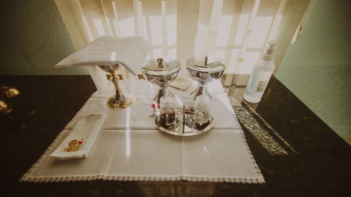 Communion chalice and plate on an altar