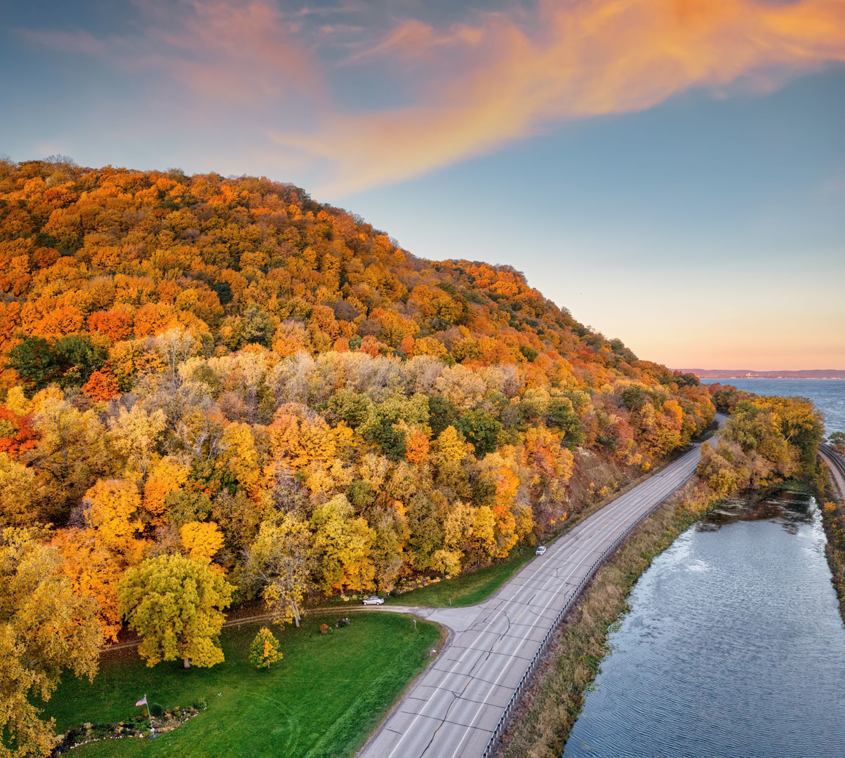 A river winding through autumn hills