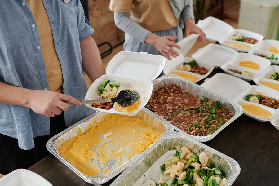 Volunteers serving meals