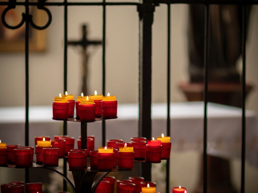 Candles lit on an altar